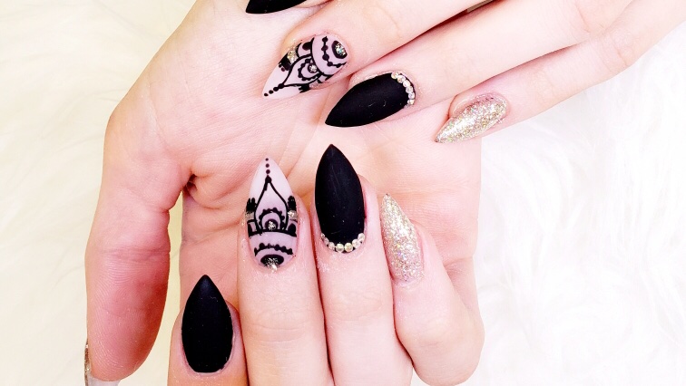 Q Nails inside Millwoods Town Centre